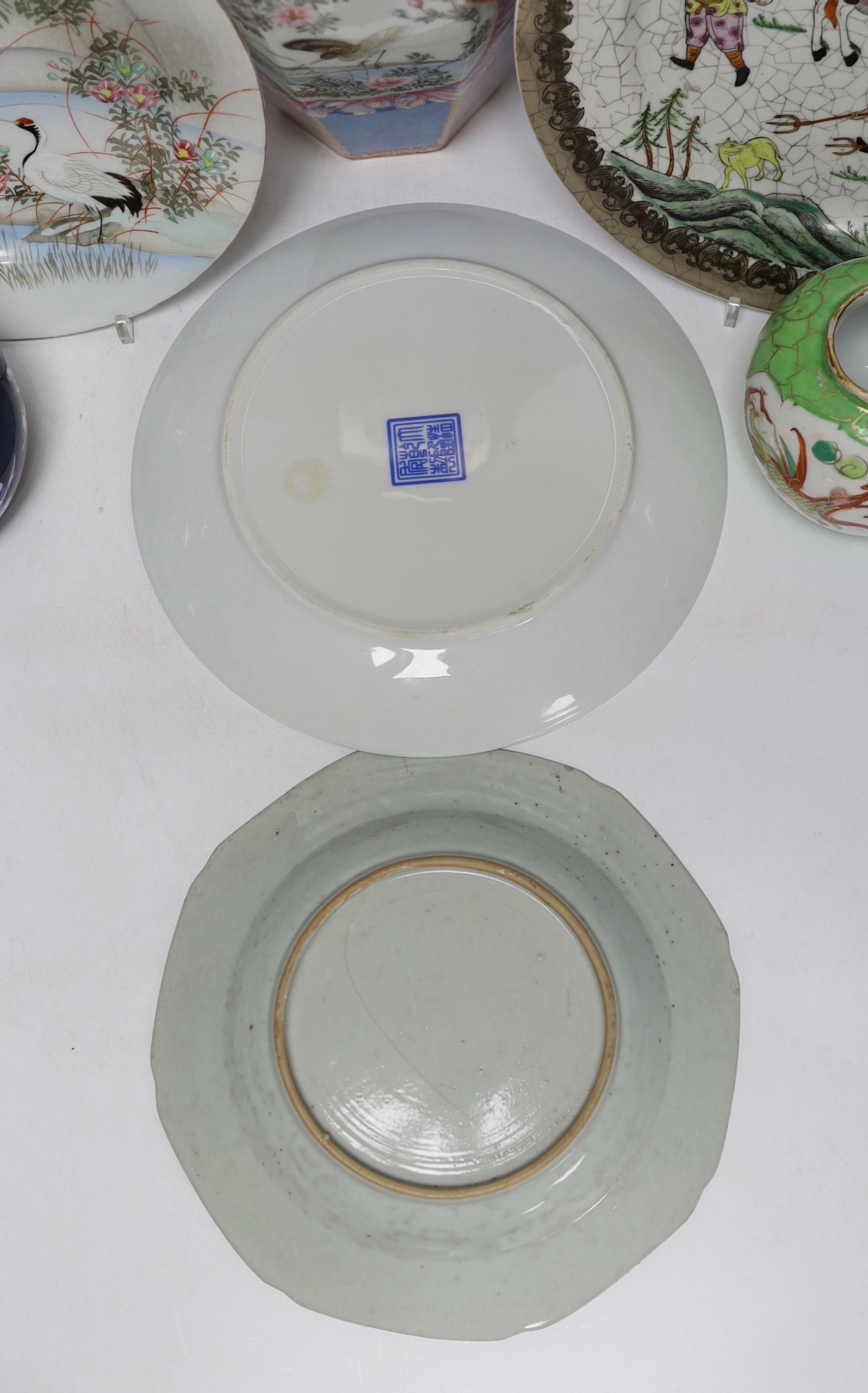 A group of Japanese and Chinese porcelain including an 18th century Chinese export dish, tallest 36cm